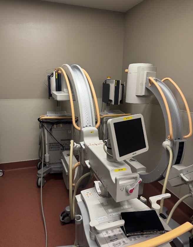 C-arms in a fluoroscopy suite